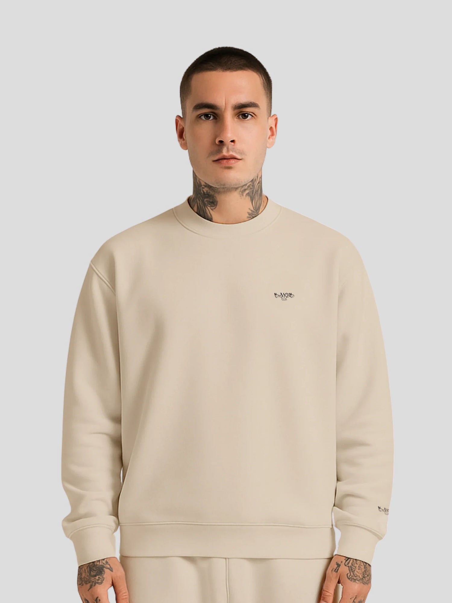 Model wearing beige oversized streetwear sweater — MAXOMclo Tops Collection