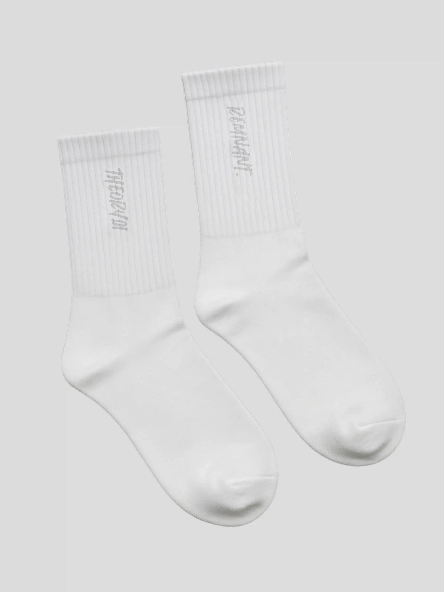 White minimalist streetwear socks with subtle REMNANT. branding — REMNANT. Socks Collection product image