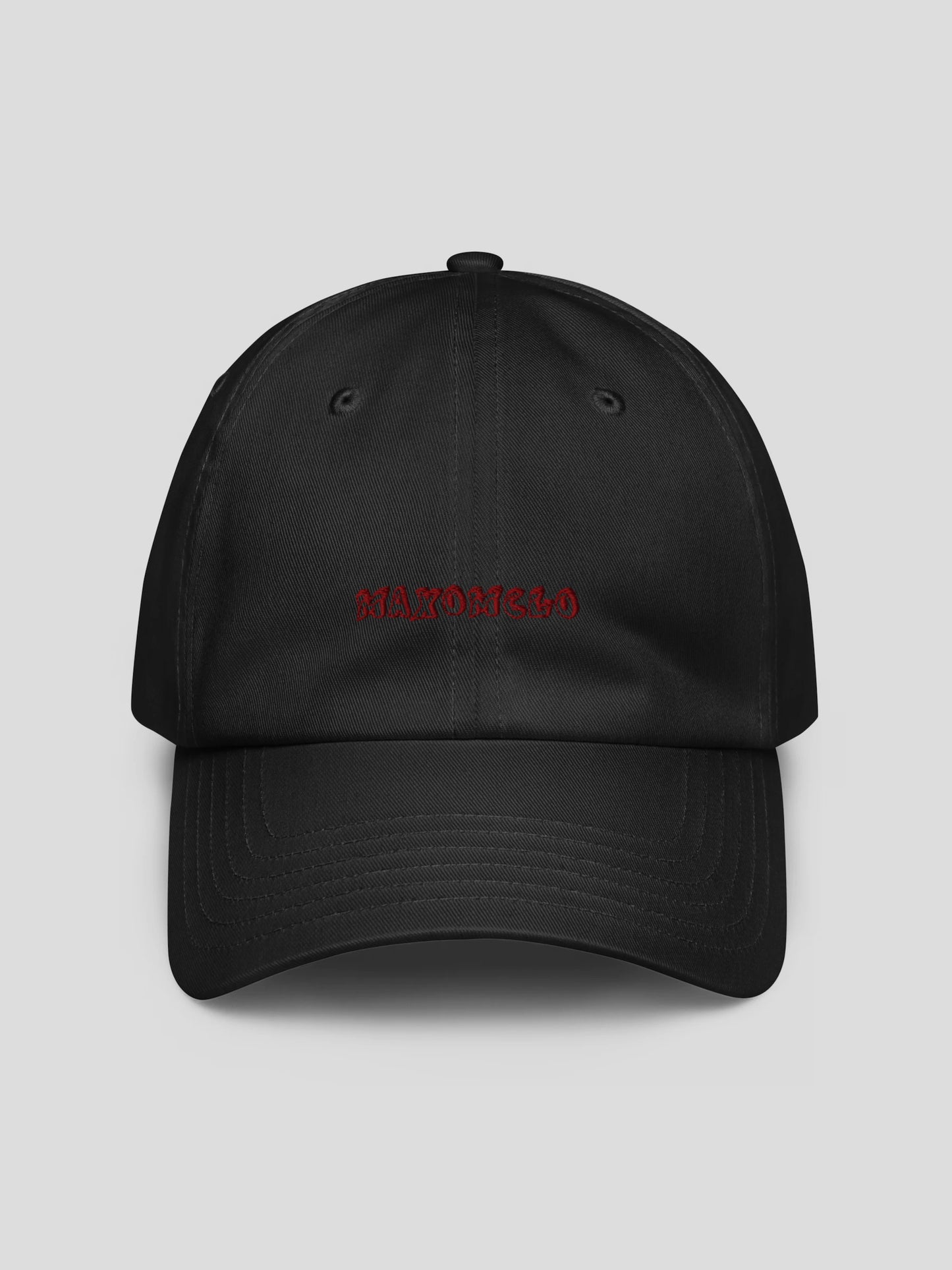 Front view of the black luxury streetwear baseball cap with embroidered logo, 6-panel low-profile design, and minimalist urban streetwear aesthetic.