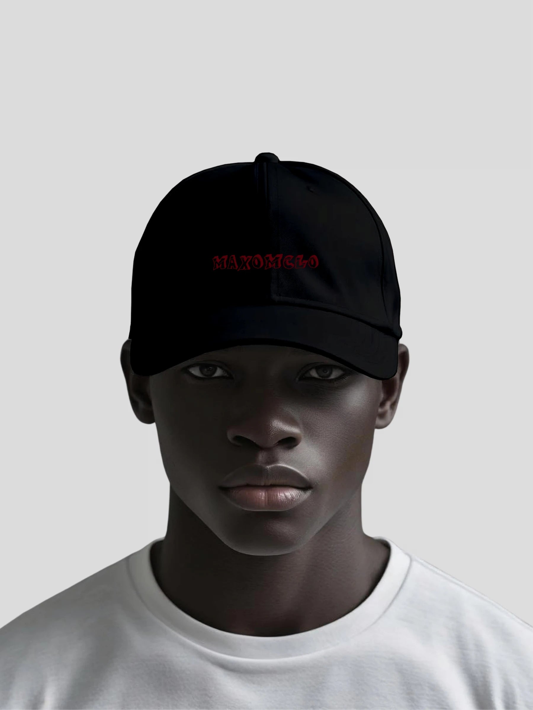 Model wearing the Crimson Stealth Unisex Baseball Cap by MAXOMclo – luxury unisex streetwear baseball cap with embroidered red MAXOMclo logo in black minimalist design.