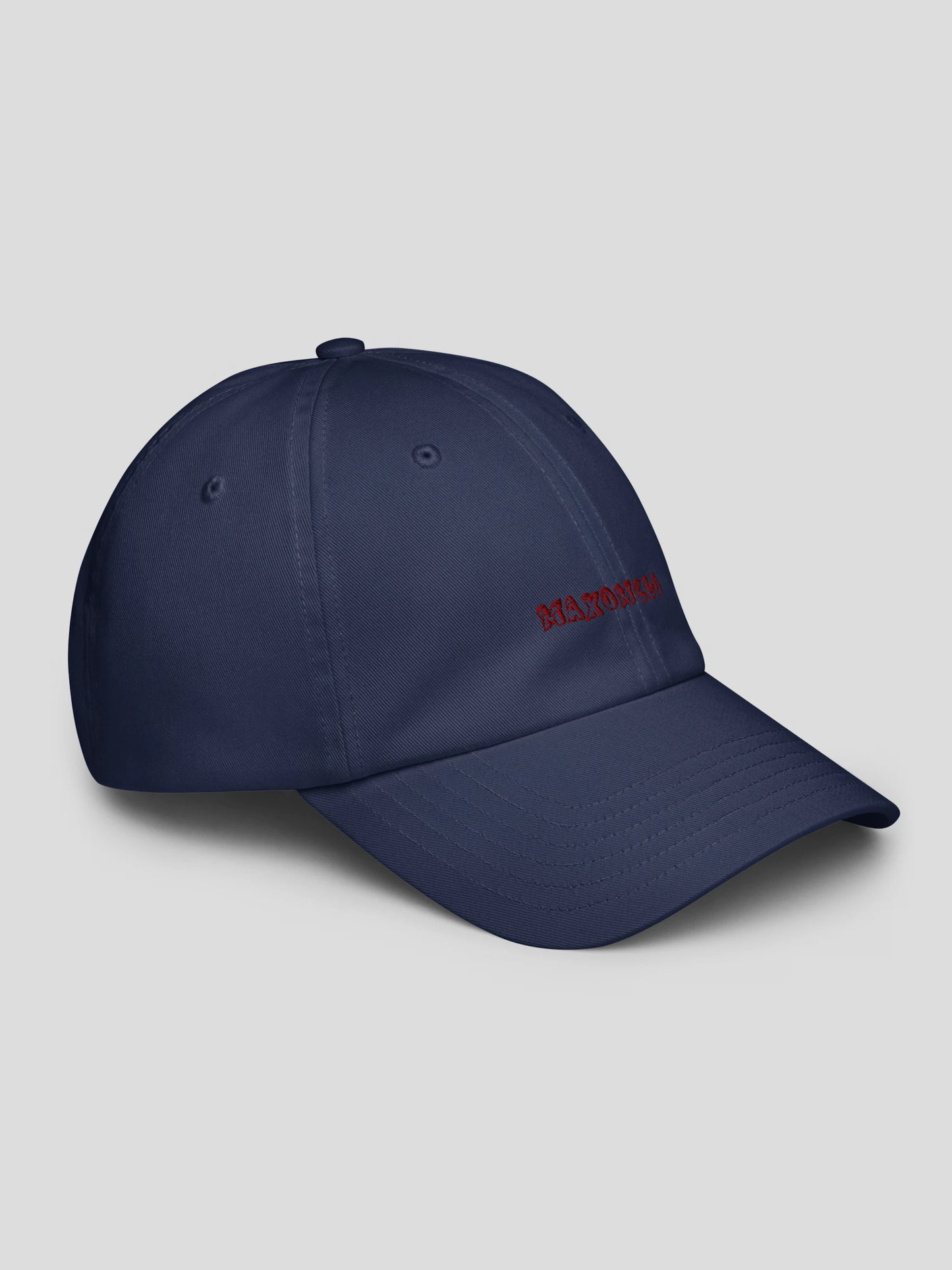 Right angle of the navy luxury street style baseball cap, highlighting refined stitching and MAXOMclo embroidered logo.