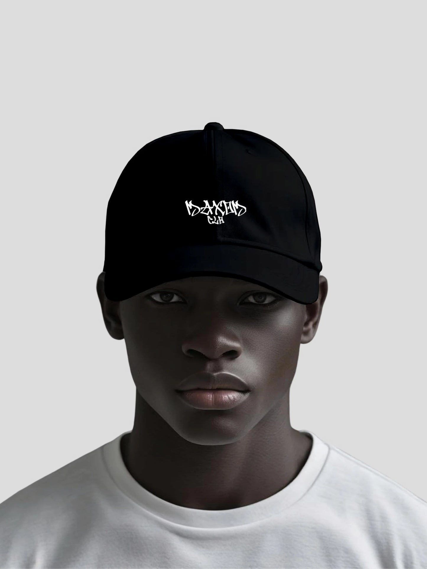 Male model wearing the ECHO Black Low-Profile Streetwear Baseball Cap by MAXOMclo – premium minimalist streetwear cap made from 100% cotton twill.