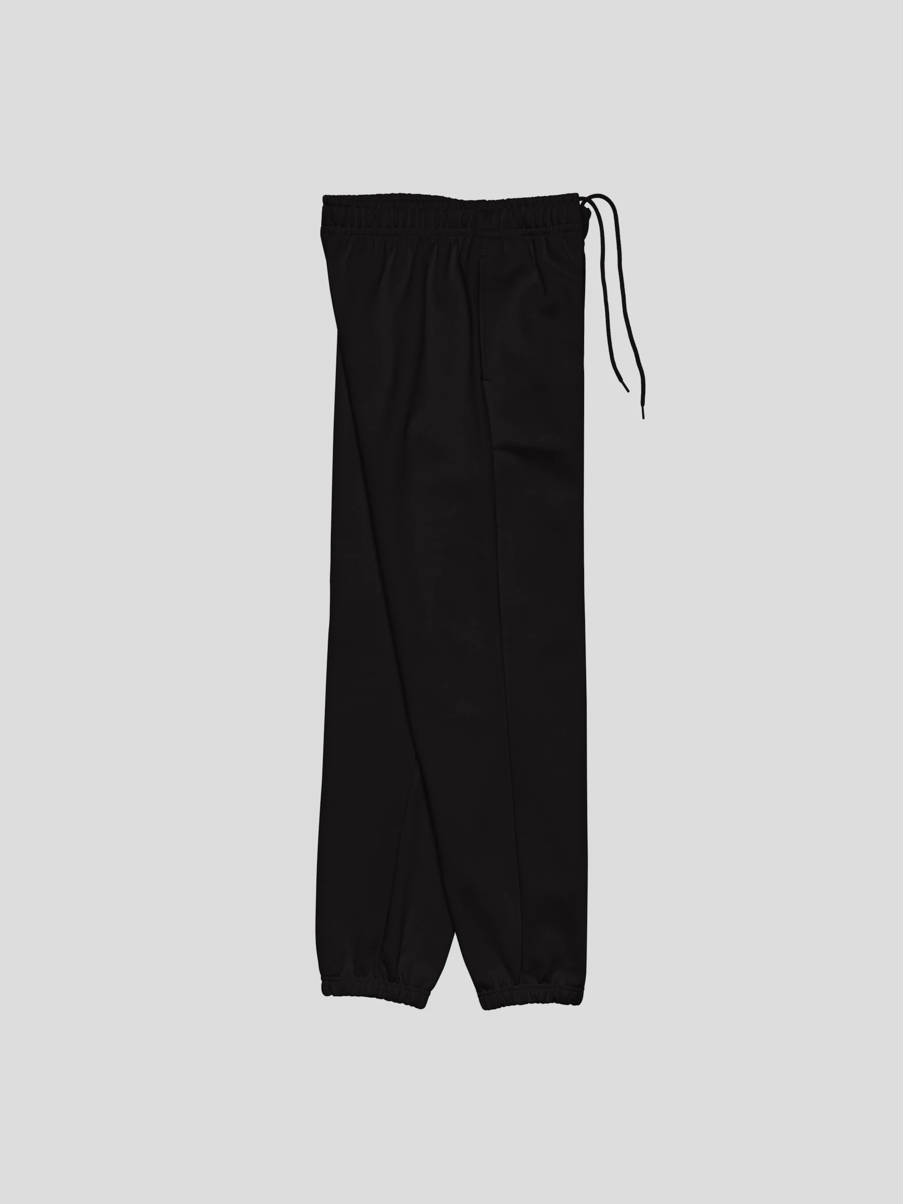 Right side angle of ECHO black oversized sweatpants