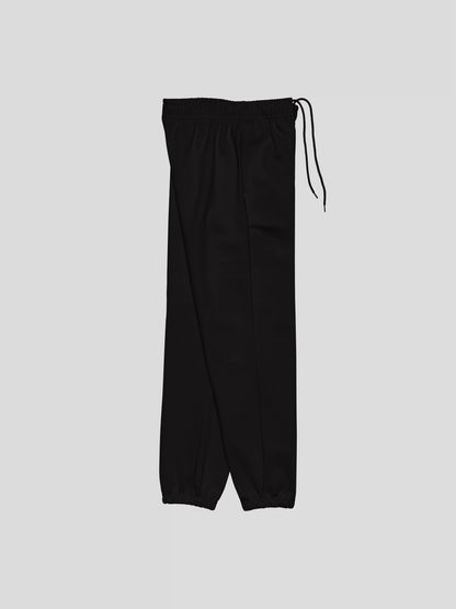 Right side angle of ECHO black oversized sweatpants