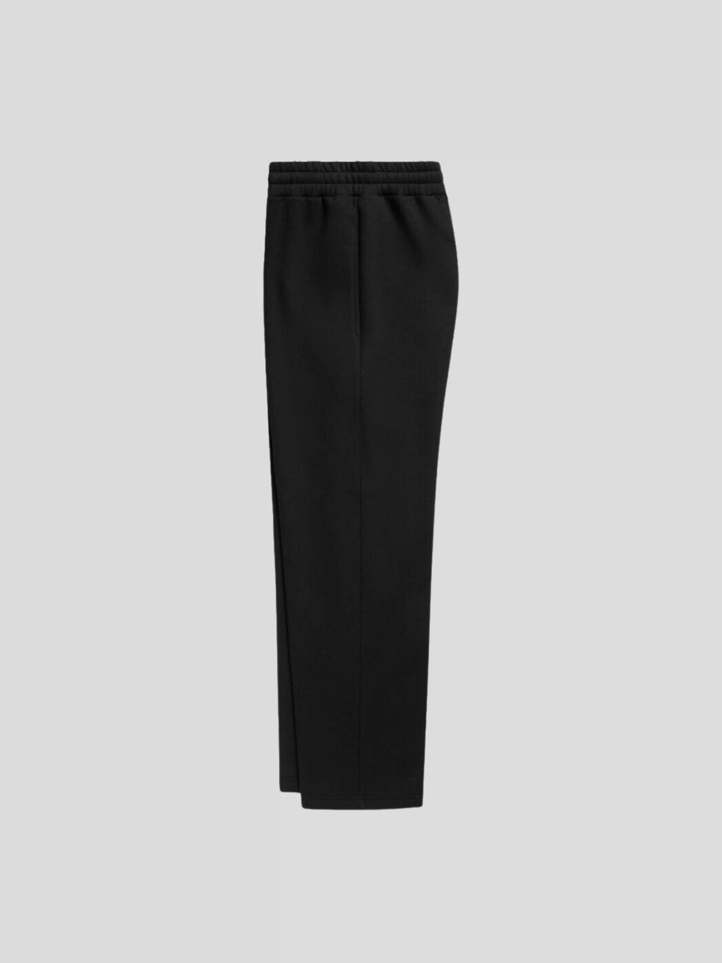 Left side of the black luxury oversized streetwear sweatpants, crafted from heavyweight cotton blend fabric.