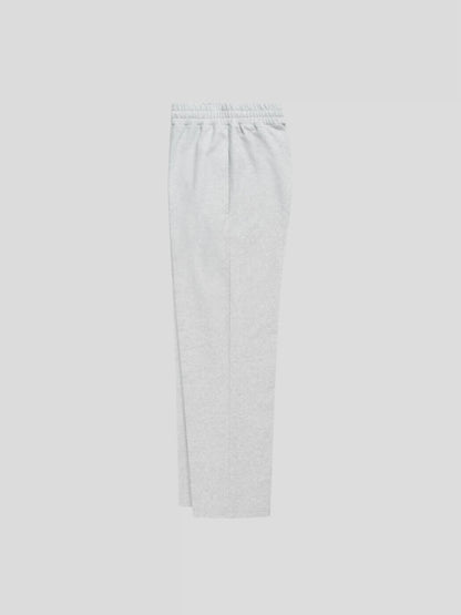Left side view of the ELYSIUM baggy grey sweatpants showcasing relaxed oversized fit and premium heavyweight construction.