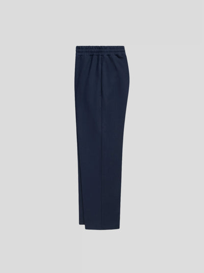 Left side of the navy oversized streetwear sweatpants – relaxed unisex joggers made from heavyweight 380 GSM fabric.