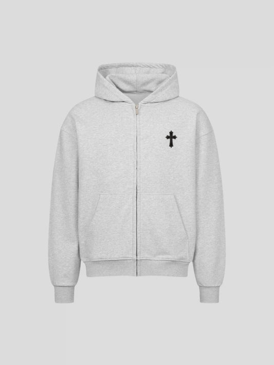 Front view of the grey oversized streetwear zip-up hoodie with minimalist black embroidered cross and metal zipper.