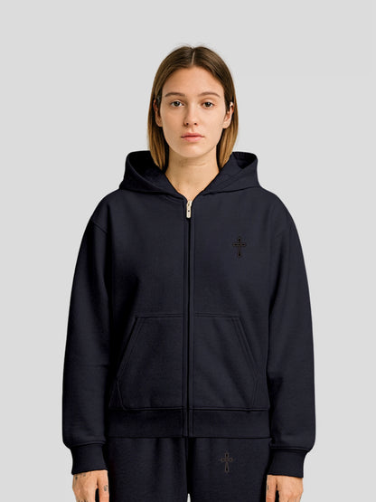 Model wearing the ELYSIUM Oversized Zipper Hoodie in Navy by MAXOMclo – luxury unisex heavyweight cotton zip-up hoodie with minimalist cross embroidery.