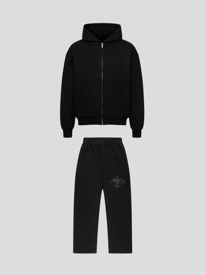 Front view of the Elysium Set BLACK by MAXOMclo – premium oversized streetwear tracksuit with 430 GSM hoodie and 380 GSM sweatpants featuring minimalist embroidered cross design.
