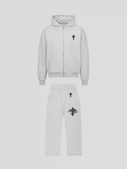 Front view of the Elysium Sweatsuit GREY by MAXOMclo – premium oversized streetwear set featuring 430 GSM zip hoodie and 380 GSM baggy sweatpants with minimalist cross embroidery.