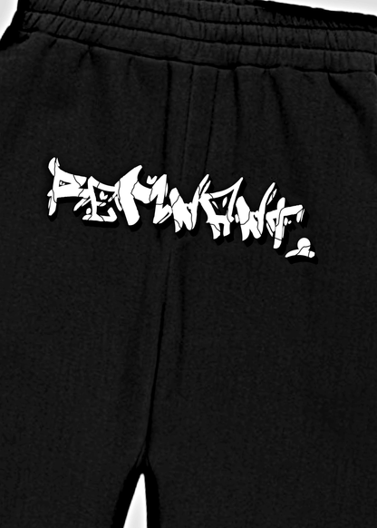 Minimalist black heavyweight sweatpants in oversized cut – rear view without graphic print, streetwear fit.