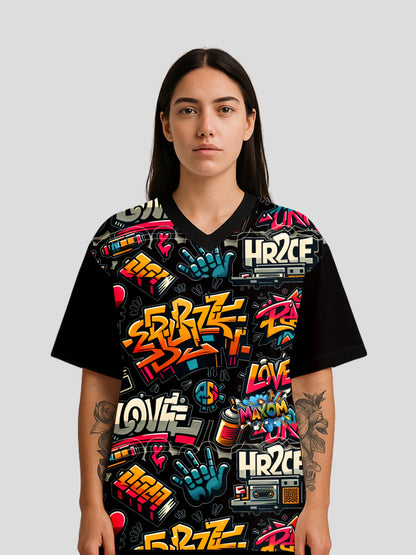 Model wearing the Oversized Streetwear Graphic Tee by MAXOMclo – a vibrant graffiti streetwear shirt with bold all-over print, 90s graffiti style, and oversized hip-hop streetwear fit.