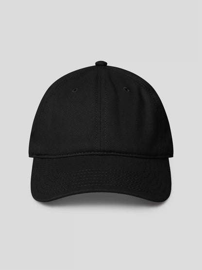 REMNANT. COLD CAP in black – minimalist low-profile streetwear baseball cap with tonal logo embroidery.
