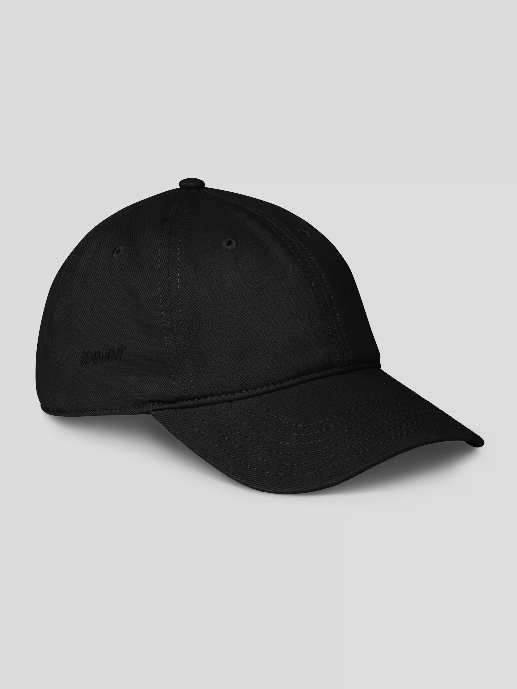 Right side of REMNANT. COLD CAP black – luxury minimalist baseball cap for modern urban outfits.