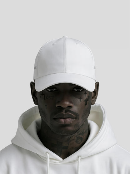 Model wearing REMNANT. COLD CAP in white – premium minimalist streetwear style by REMNANT.