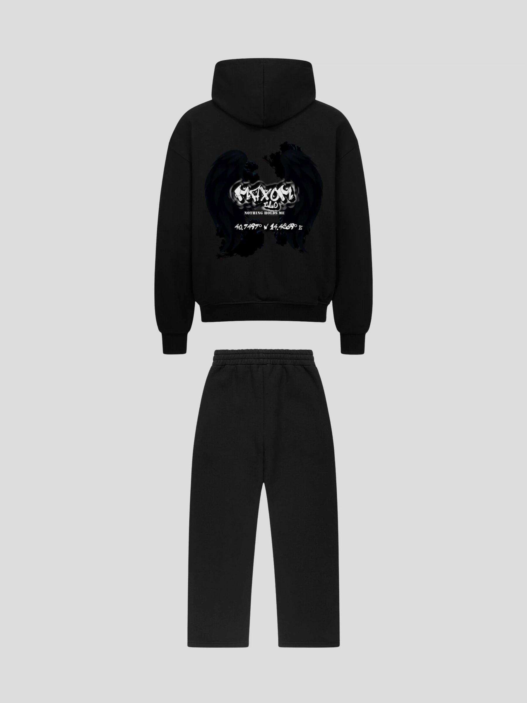 Back view of REMNANT ECLIPSE_R0 black streetwear set featuring angel wing graphic and Nothing Holds Me quote by MAXOMclo