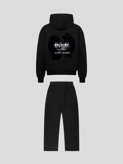 Back view of REMNANT ECLIPSE_R0 black streetwear set featuring angel wing graphic and Nothing Holds Me quote by MAXOMclo