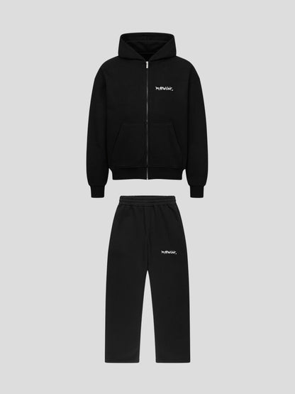 Flat lay front view of REMNANT ECLIPSE_R0 black oversized hoodie and baggy sweatpants streetwear set with graffiti logo