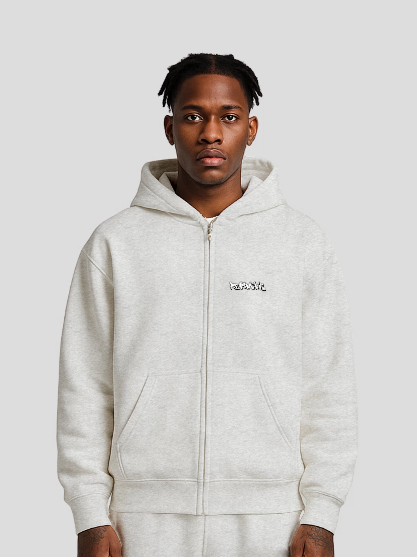 Model wearing REMNANT. ECLIPSE_R0 Oversized Zipper Hoodie in grey – 430 GSM streetwear cotton hoodie