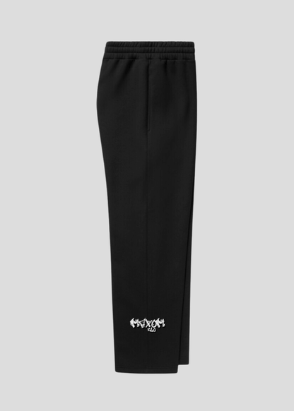 Oversized black streetwear sweatpants from the Drop One collection – left-side view without logo.
