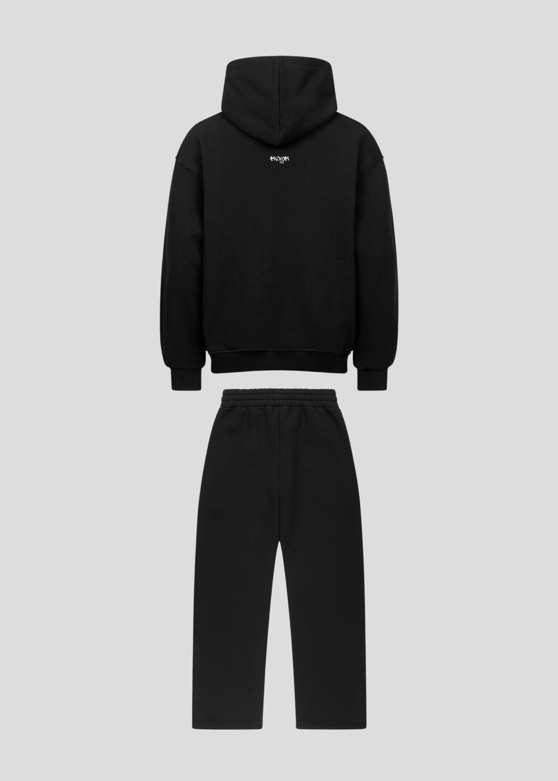Back flatlay of black oversized graffiti hoodie and sweatpants set
