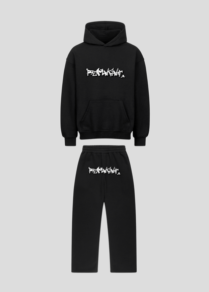 Front flatlay of black oversized graffiti hoodie and sweatpants set