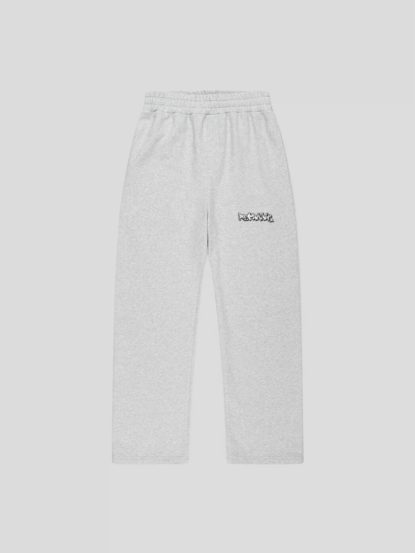 Front view of REMNANT. LIMITED grey sweatpants with REMNANT. logo print on thigh