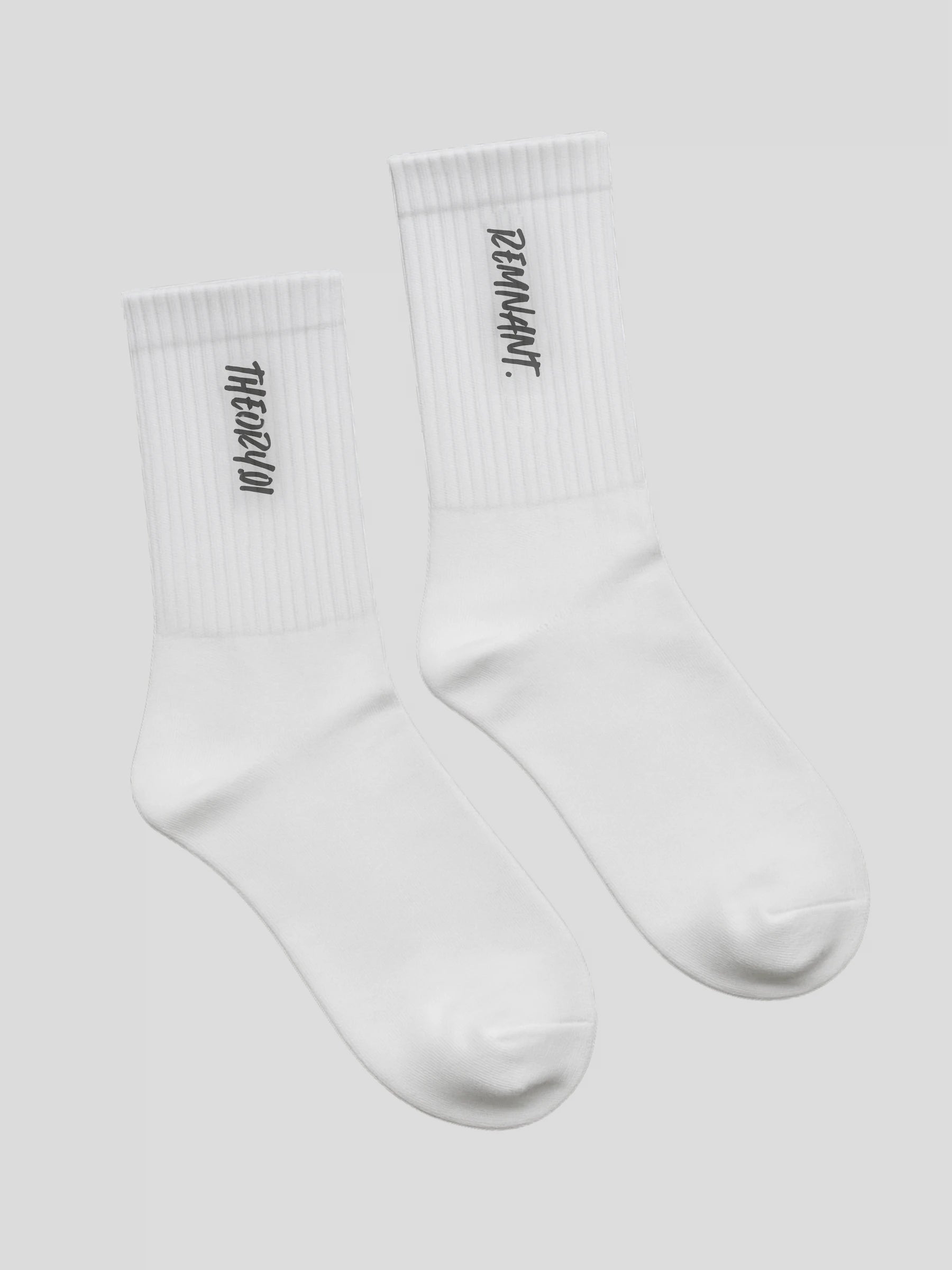 Black REMNANT. THEORY01 embroidered streetwear socks with cushioned sole – premium cotton design