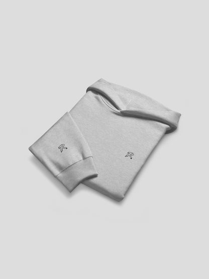 Folded flat lay of REMNANT. THEORY.01 Hoodie in COLD Grey – premium heavyweight cotton hoodie with minimalist logo embroidery