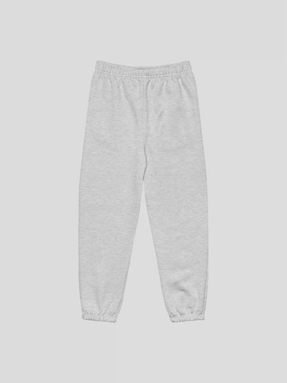 Back view of REMNANT. THEORY.01 SWEATS in COLD Grey – relaxed fit brushed fleece joggers with elastic cuffs and clean design