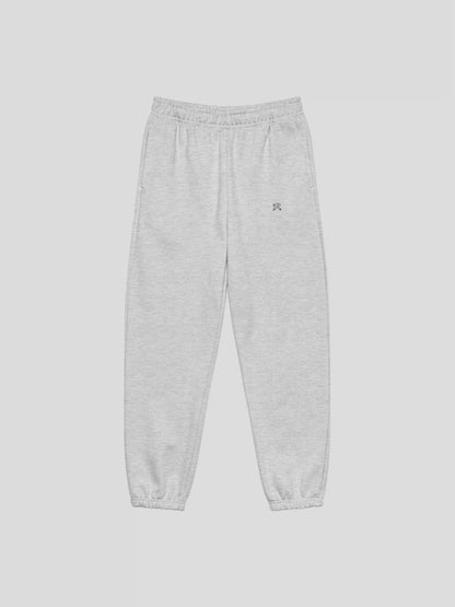 Front view of REMNANT. THEORY.01 SWEATS in COLD Grey – oversized heavyweight fleece streetwear sweatpants with minimalist logo