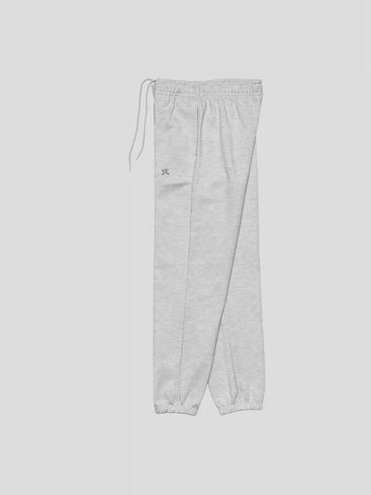 Left side angle of REMNANT. THEORY.01 SWEATS in COLD Grey – heavyweight fleece sweatpants for minimal streetwear looks