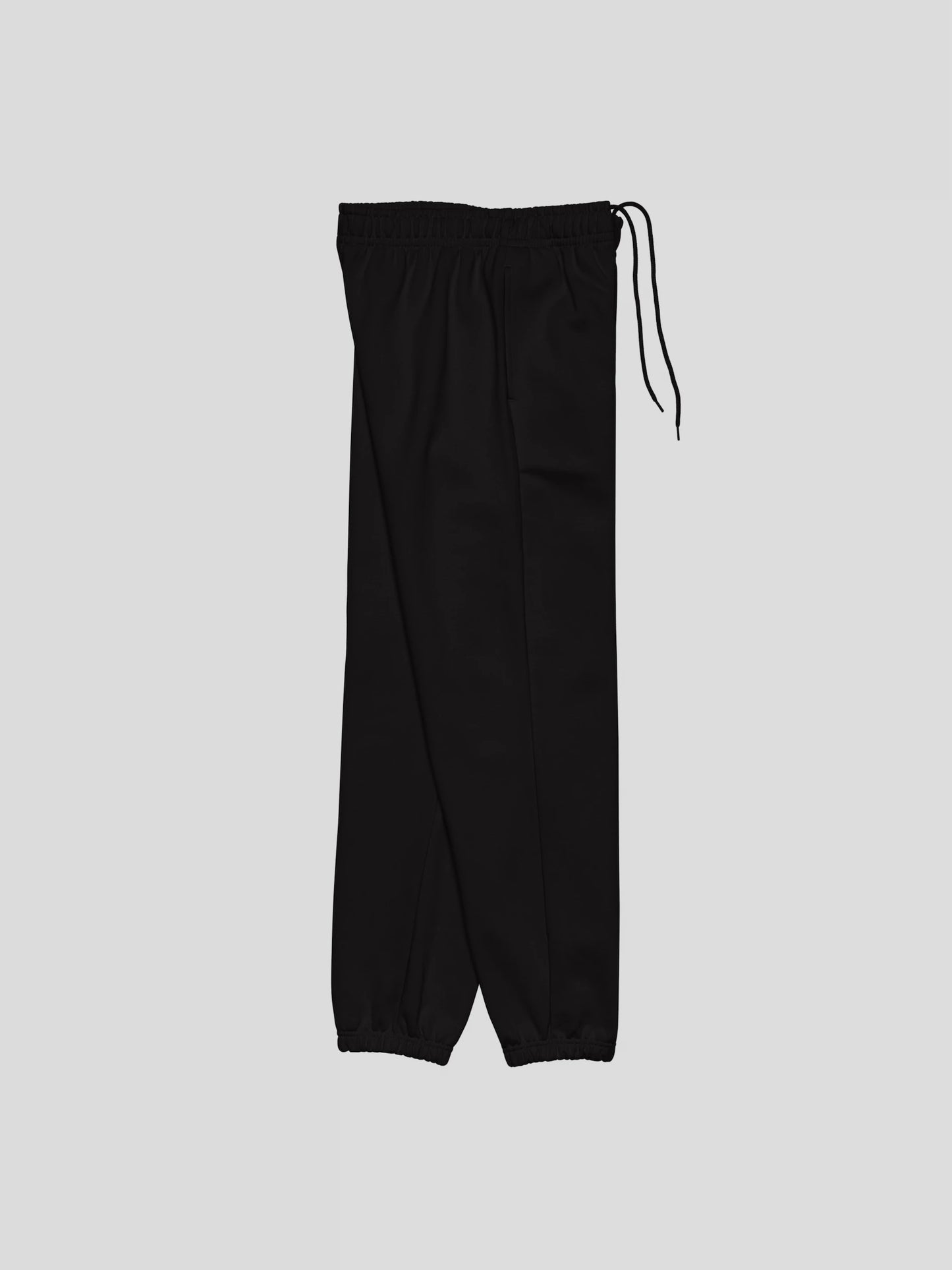 Right side view of REMNANT. THEORY.01 SWEATS in NOIR Black – baggy fit heavyweight joggers with minimalist silhouette