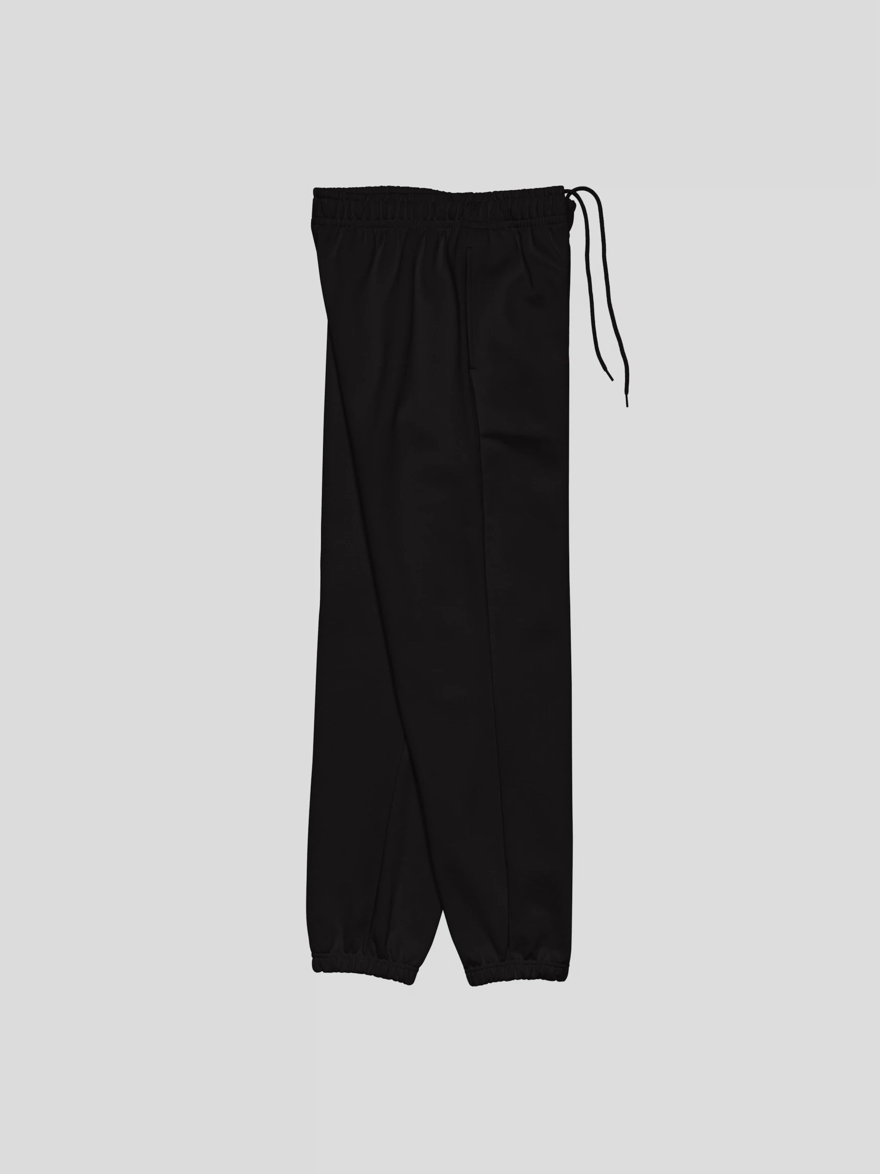 Right side view of REMNANT. THEORY.01 SWEATS in NOIR Black – baggy fit heavyweight joggers with minimalist silhouette