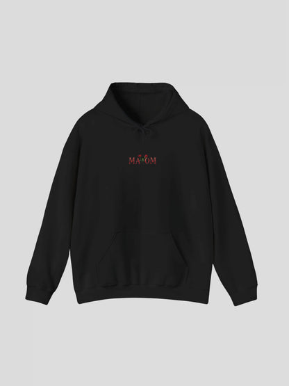 Front view of the Black Rose Streetwear Hoodie with embroidered rose logo and MAXOM branding – a luxury streetwear hoodie with rose design.
