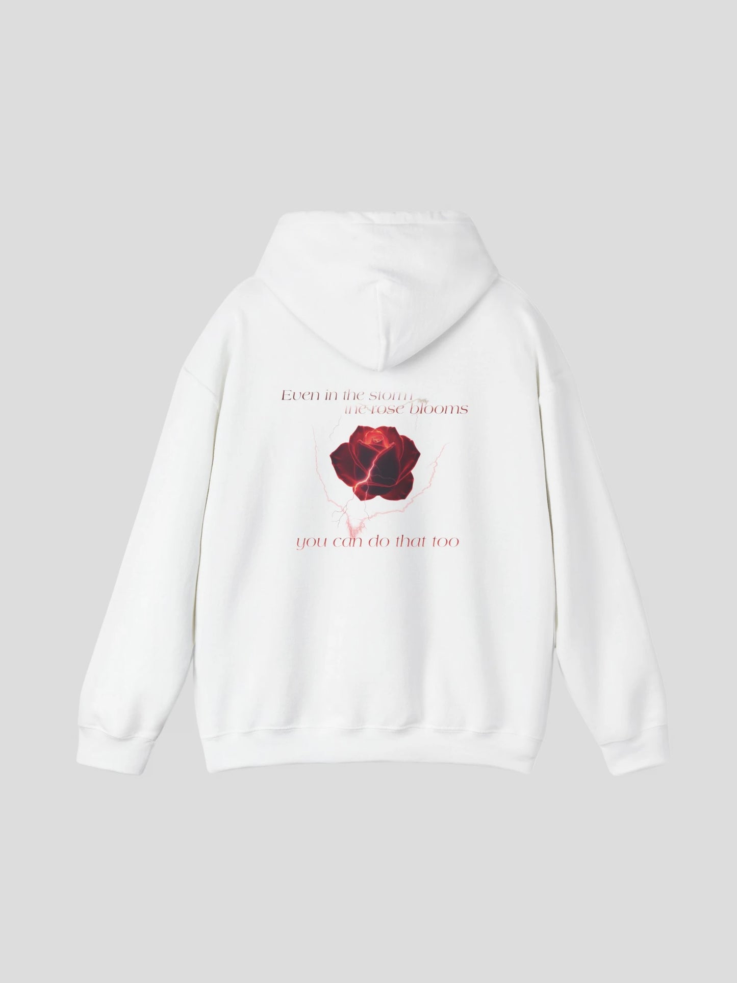 Back view of the Rose Graphic Streetwear Hoodie in white showing the motivational quote and rose design – an inspirational quote streetwear hoodie crafted from soft fleece.