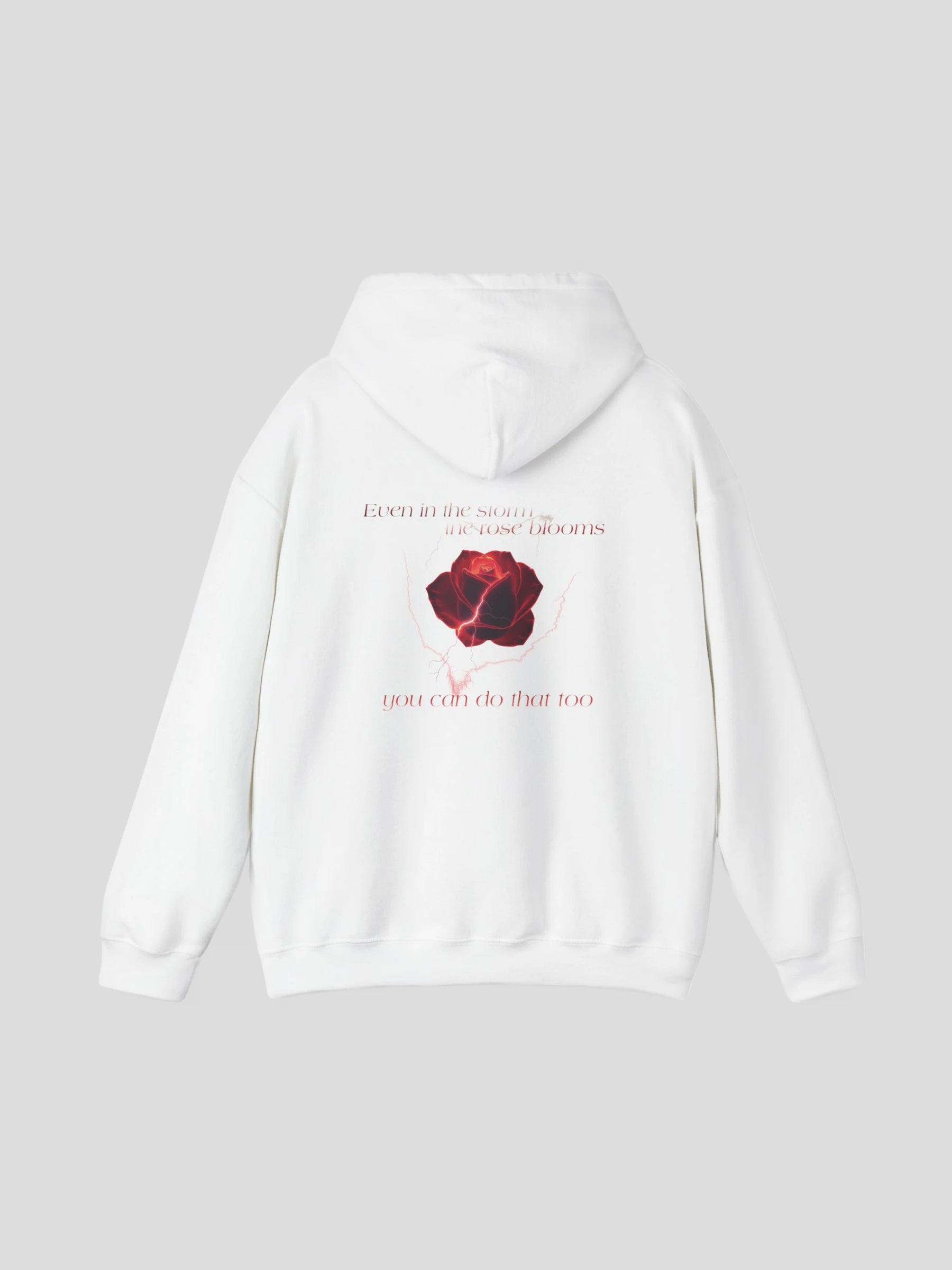 Back view of the Rose Graphic Streetwear Hoodie in white showing the motivational quote and rose design – an inspirational quote streetwear hoodie crafted from soft fleece.