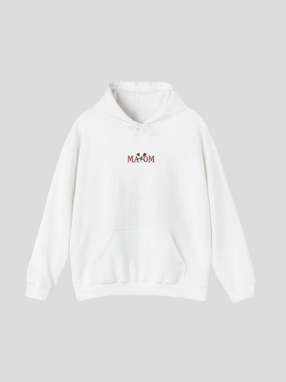 Front view of the White Rose Streetwear Hoodie featuring a floral rose logo print and minimalist MAXOM branding – a luxury streetwear hoodie with rose design.