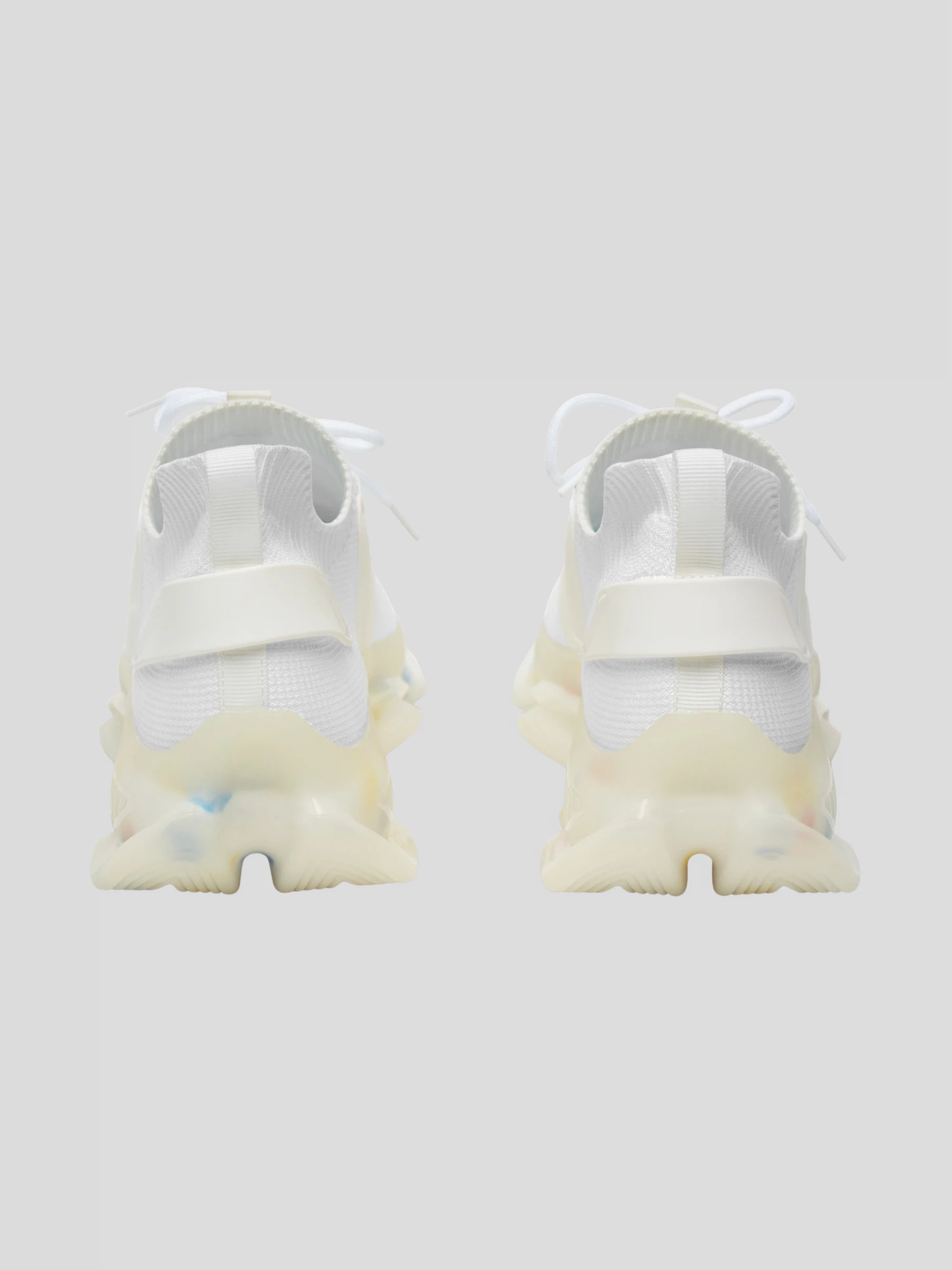 Rear view of MAXOMclo SoulStride Men’s White Sneakers – modern streetwear shoes with translucent sole and clean white finish.